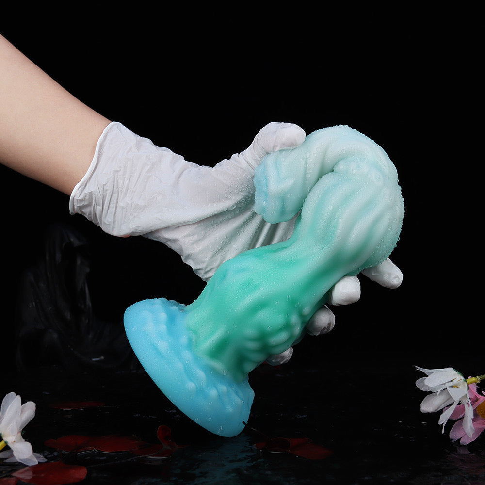 Silicone fantasy dragon lights up huge butt plug