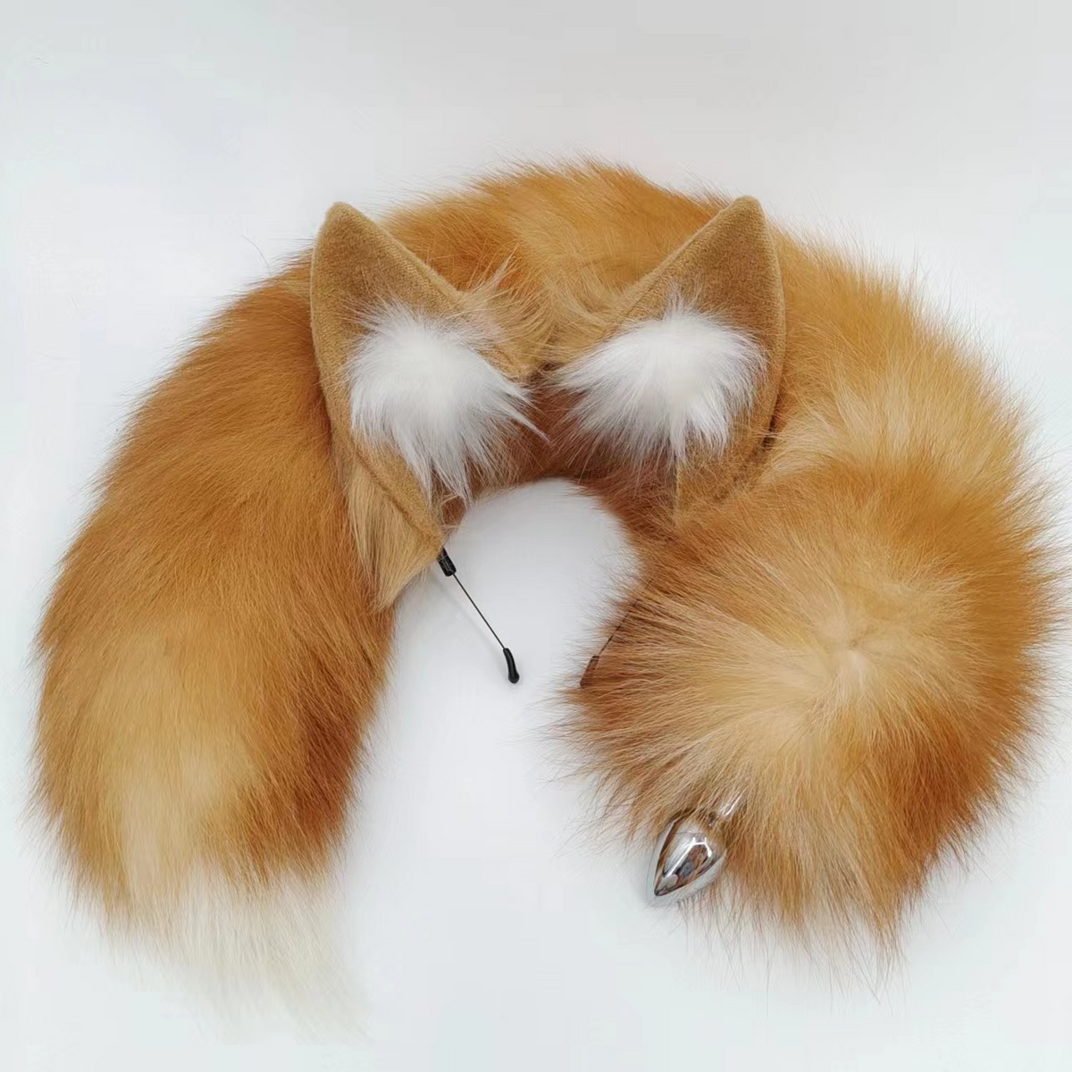 Orange small anal fox tail butt plug