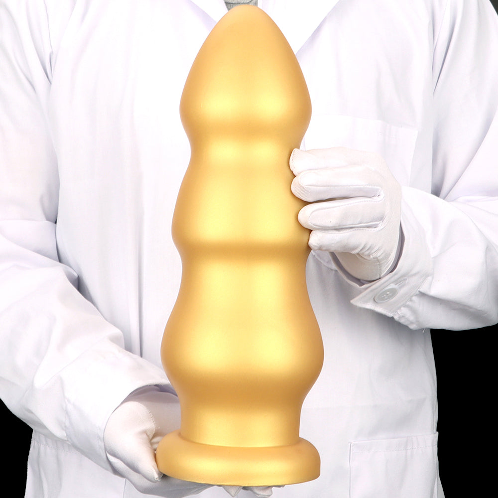 Thick silicone gold 3 inch diameter butt plug