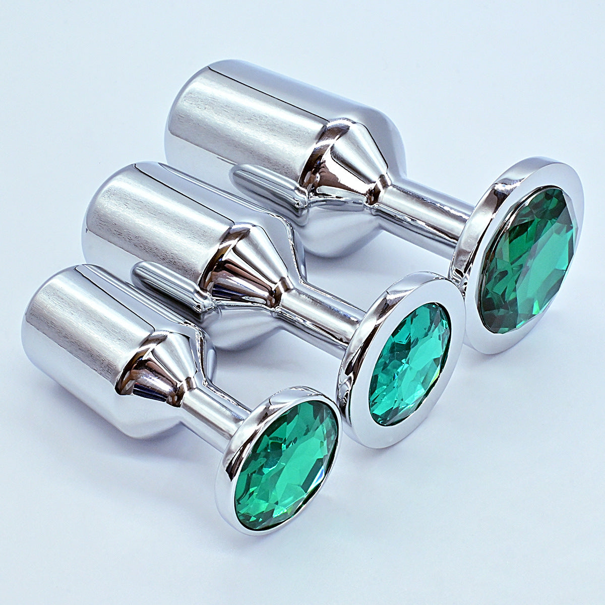 Green metal gem jeweled butt plug