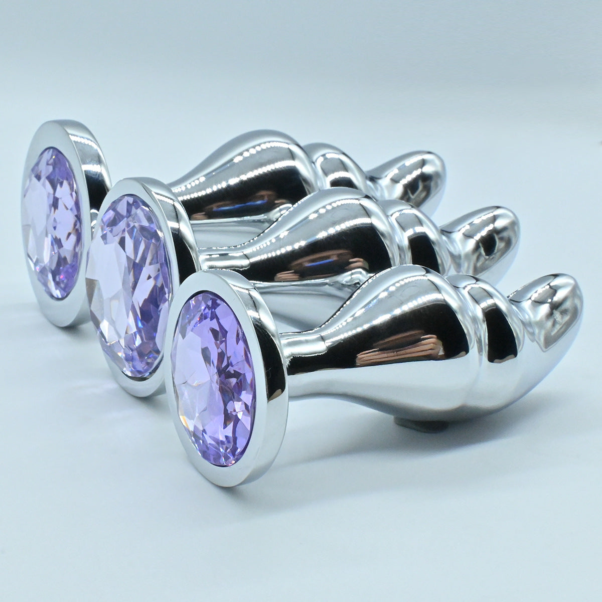 G spot purple metal jeweled butt plug