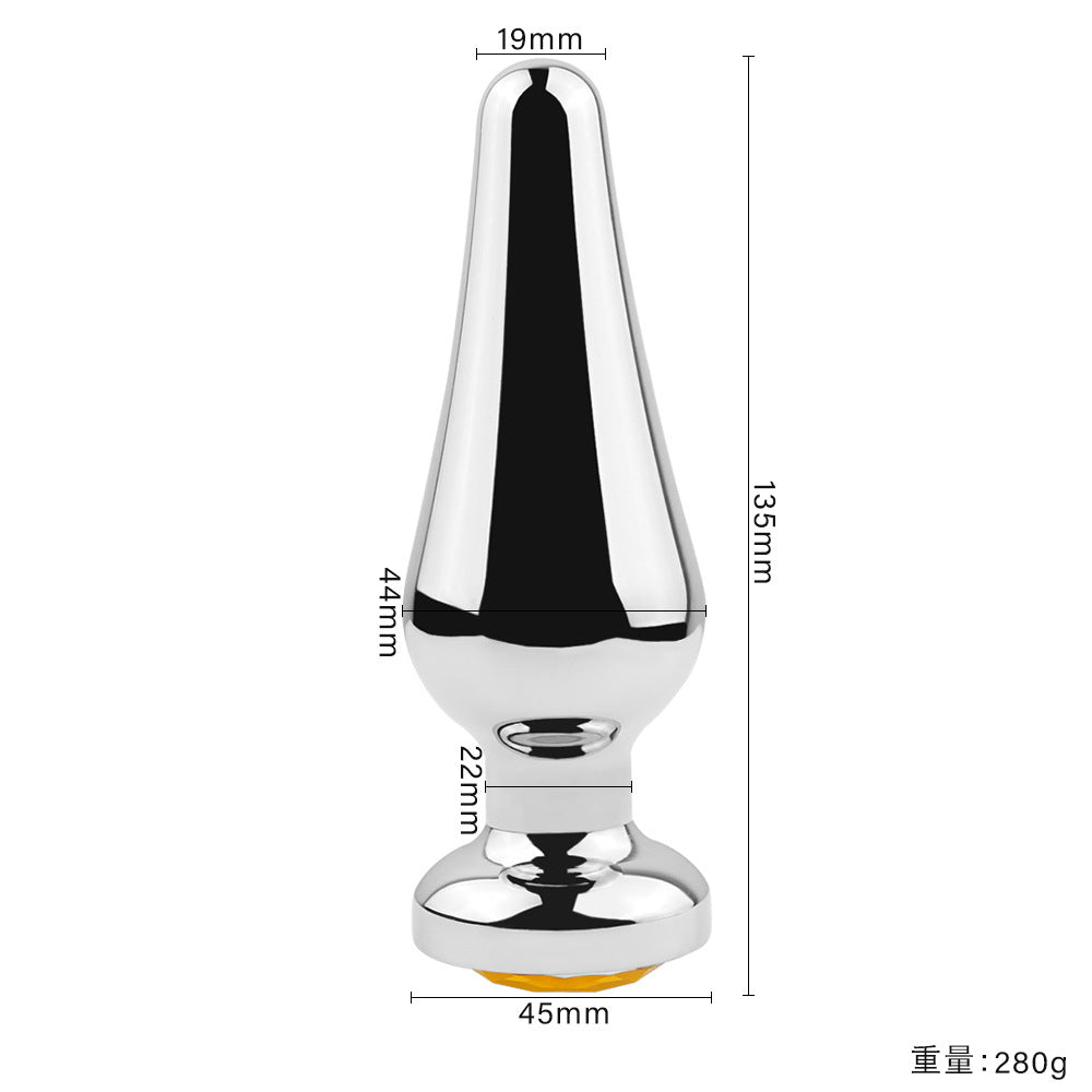 Yellow tapered metal jeweled butt plugs